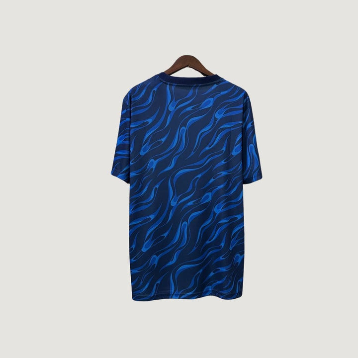 Real Madrid – Maillot Pré-Match 25/26 – Bleu Marine & Motifs Bleus